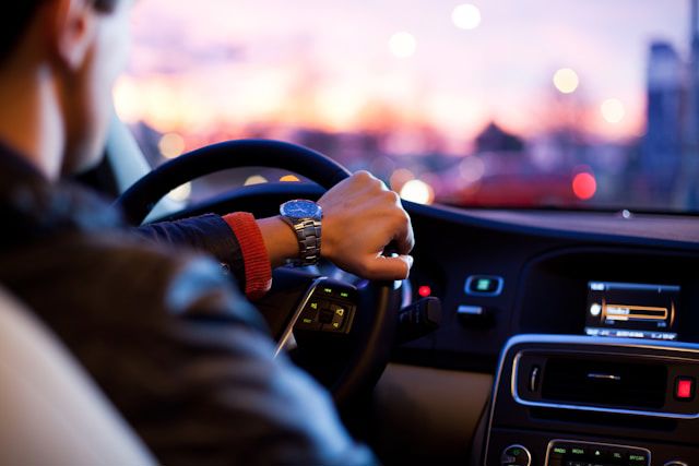 Countries Where You Need to Rent a car. Picture of a man driving a car.